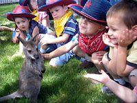 Roo the kangaroo hanging out with some kids